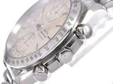 a close up of a wrist watch on a white background