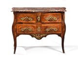 a marble top chest of drawers with a marble top