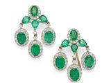 a pair of emerald and diamond earrings