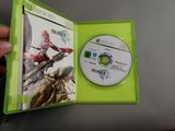 someone is holding a green case with a game on it