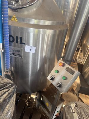 an image of a stainless steel tank in a factory