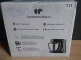 boxed box of a kitchen appliance on a wooden table