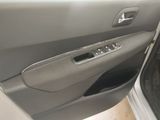 the door of a car with the driver ' s side door open