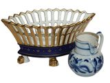 a blue and white bowl and a blue and white vase