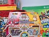 a lot of different toys and games on the table