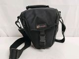 an image of a camera bag sitting on a white surface