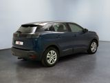 a picture of a blue car parked in a showroom