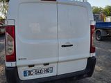 a white van that is parked in a lot