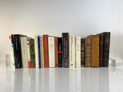 a lot of books that are sitting on a table
