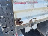 a close up of a truck with rust on the side of it