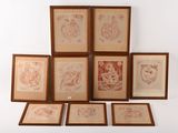 several framed drawings of animals and birds on a white wall