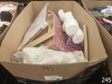 a cardboard box with a lot of items inside of it