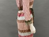 a mannequin dress with multicolored stripes on a mannequin mannequin