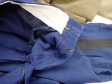 a close up of a pair of pants and a jacket