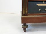 an antique wooden chest of drawers with three drawers on each side