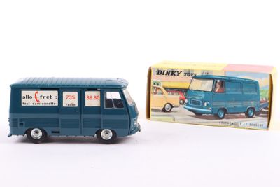 a blue toy bus that is next to a box