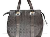 Sac cabas Guccissi en cuir marron avec finitions dorées