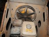 an old stove with a bunch of items inside of it