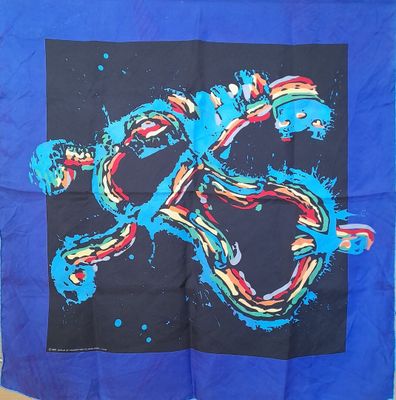 a blue scarf with a picture of a snake on it