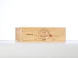 a close up of a wooden box on a table with a white background