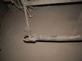 a pipe that has been removed from the floor of a room