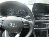 a picture of a car dashboard with a steering wheel and dashboard gauges