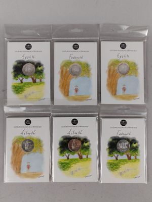 six cartes sur lesquelles sont représentés une balle de golf et des arbres