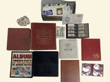 a box of books and other items that are on the table