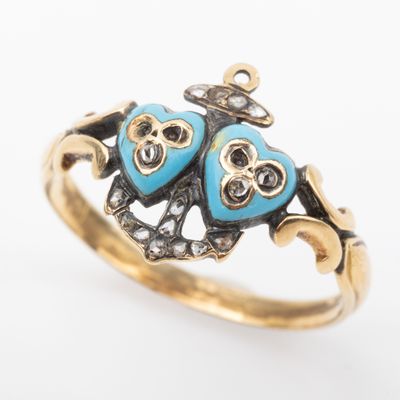 an image of a close up of a ring with two owls on it