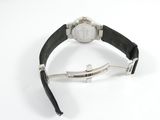 an image of a watch on a black leather strap on a white surface
