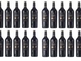 a bunch of bottles of wine sitting next to each other