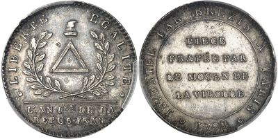a close up of a silver coin with an image of a man on it