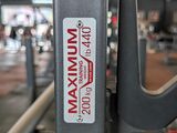 a close up of a gym equipment with a sign on it
