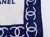 a cake that has a chanel logo on it