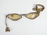 an old pair of glasses with a tag on the side of them