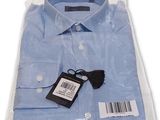 the shirt has a tag on it and a tag is attached to it