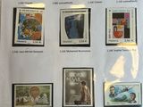 a picture of a collection of stamps on a sheet of paper