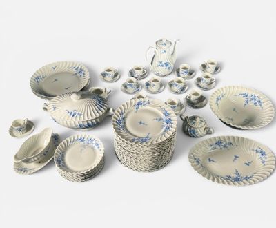 many different types of blue and white dishes and cups
