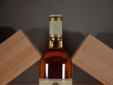 a bottle of wine that is sitting on a table