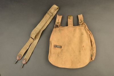 a small bag with a pair of pliers on it