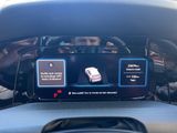 a picture of a car dashboard with a display on it