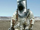 a man in a space suit sitting on a toilet in the desert