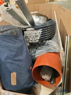 a box full of assorted items in a room