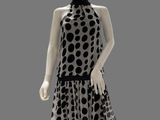an image of a mannequin dressed in a polka dot print dress