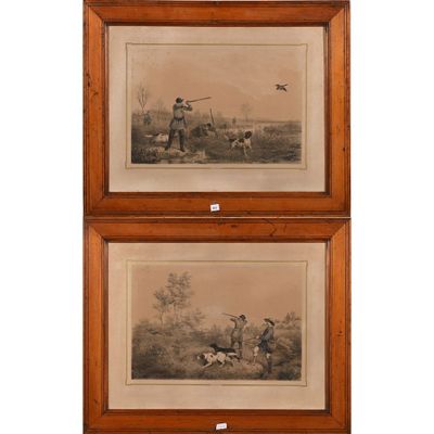 deux gravures encadrées représentant des chasseurs et leurs chiens dans un décor boisé