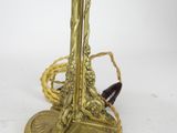 an image of a brass table lamp with a bird on it
