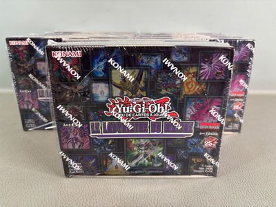 two packs of yu - gi - oh trading cards are sitting on a table
