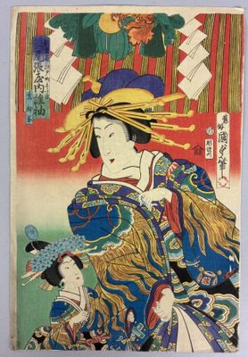 an image of a woman in a blue hat holding a baby