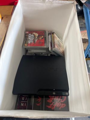 a white box with a game system inside of it