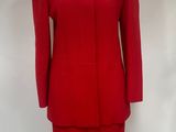 an image of a red dress and jacket on a mannequin